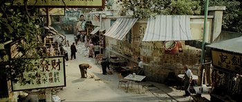 A group of people standing outside of a building
