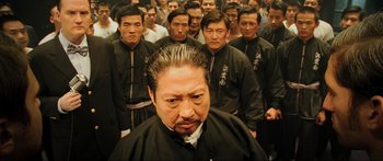 Movie still from “Ip Man 2” (2010), directed by Wilson Yip – A group of men standing next to each other; Close Up shot, High angle
