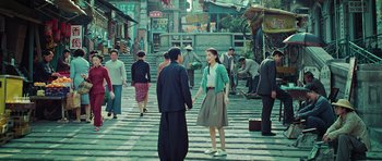 Movie still from “Ip Man 3” (2015), directed by Wilson Yip – A group of people standing on a street; Wide shot, High angle