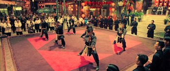 Movie still from “Ip Man 4: The Finale” (2019), directed by Wilson Yip – A group of men in traditional martial arts outfits; Wide shot, High angle