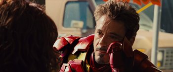 Movie still from “Iron Man 2” (2010), directed by Jon Favreau – A person wearing a suit of iron man armor; Close Up shot, Over the shoulder angle