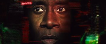 Movie still from “Iron Man 2” (2010), directed by Jon Favreau – A man's face with red and black eyes; Extreme Close Up shot, Low angle