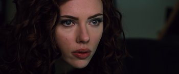 Movie still from “Iron Man 2” (2010), directed by Jon Favreau – A woman's eyes and lips; Close Up shot, Over the shoulder angle