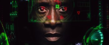 Movie still from “Iron Man 2” (2010), directed by Jon Favreau – A person's face with red eyes; Extreme Close Up shot, High angle