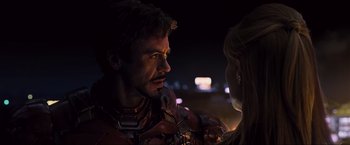 Movie still from “Iron Man 2” (2010), directed by Jon Favreau – A man and a woman talking to each other; Close Up shot, Over the shoulder angle