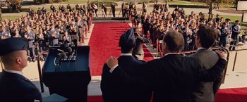Movie still from “Iron Man 2” (2010), directed by Jon Favreau – A crowd of people standing on a red carpet; Wide shot, Over the shoulder angle