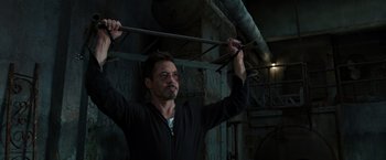 Movie still from “Iron Man 3” (2013), directed by Shane Black – Medium shot, Low angle