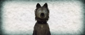 Movie still from “Isle of Dogs” (2018), directed by Wes Anderson – A dog that has a collar around it's neck; Medium shot, Low angle