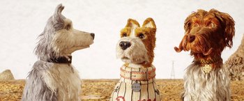 Movie still from “Isle of Dogs” (2018), directed by Wes Anderson – Two dogs are standing next to each other; Close Up shot, Low angle