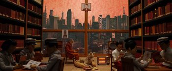 Movie still from “Isle of Dogs” (2018), directed by Wes Anderson – A dog laying on the floor in front of a large window; Extreme Wide shot, High angle