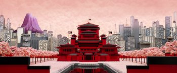 Movie still from “Isle of Dogs” (2018), directed by Wes Anderson – A large red building with a reflection of the sky in it's water; Extreme Wide shot, Low angle