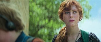 Movie still from “It” (2017), directed by Andy Muschietti – A person with long red hair; Close Up shot, Over the shoulder angle