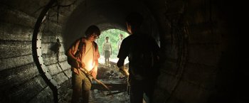 Movie still from “It” (2017), directed by Andy Muschietti – A group of young people in a tunnel; Medium shot, Low angle