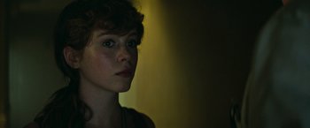 Movie still from “It” (2017), directed by Andy Muschietti – A person looking at the camera; Close Up shot, Over the shoulder angle