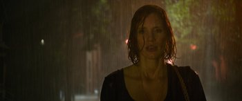 Movie still from “It Chapter Two” (2019), directed by Andy Muschietti – A woman standing in the rain with her mouth open; Close Up shot, Low angle