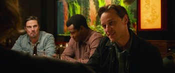 Movie still from “It Chapter Two” (2019), directed by Andy Muschietti – Two men sitting at a table with a glass of beer in front of them; Close Up shot, Over the shoulder angle