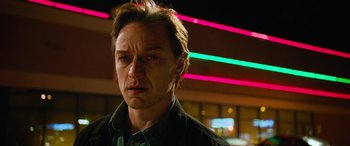 Movie still from “It Chapter Two” (2019), directed by Andy Muschietti – A person wearing a green shirt; Close Up shot, Low angle