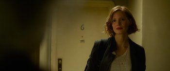 Movie still from “It Chapter Two” (2019), directed by Andy Muschietti – A woman standing in front of a door way; Close Up shot, Low angle