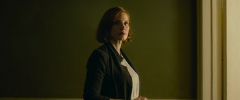 Movie still from “It Chapter Two” (2019), directed by Andy Muschietti – A woman with red hair wearing a black jacket; Medium shot, Low angle