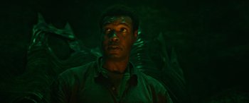 Movie still from “It Chapter Two” (2019), directed by Andy Muschietti – A man standing in the middle of a forest; Close Up shot, Low angle