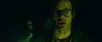 Movie still from “It Chapter Two” (2019), directed by Andy Muschietti – A person wearing glasses; Close Up shot, Over the shoulder angle