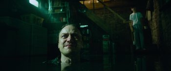 Movie still from “It Chapter Two” (2019), directed by Andy Muschietti – A person in a dark room; Close Up shot, Low angle