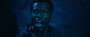 Movie still from “It Chapter Two” (2019), directed by Andy Muschietti – A person with his mouth wide open; Close Up shot, Overhead angle