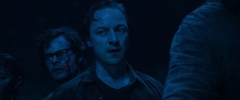 Movie still from “It Chapter Two” (2019), directed by Andy Muschietti – A person wearing a black shirt; Close Up shot, Low angle