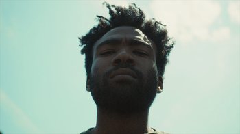 Movie still from “Atlanta” (2016), created by Donald Glover – Close Up shot, Low angle
