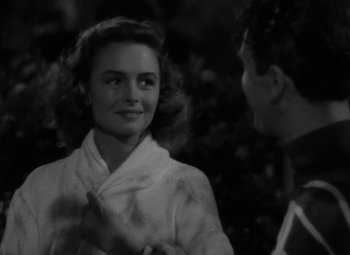 Movie still from “It's a Wonderful Life” (1946), directed by Frank Capra – An old photo of a man and a woman; Close Up shot, Over the shoulder angle