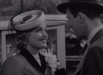 Movie still from “It's a Wonderful Life” (1946), directed by Frank Capra – A man and a woman are talking to each other; Close Up shot, Over the shoulder angle