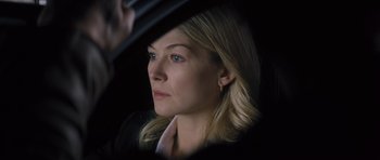 Movie still from “Jack Reacher” (2012), directed by Christopher McQuarrie – A person in a car; Close Up shot, Over the shoulder angle