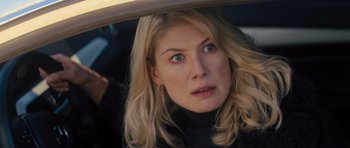 Movie still from “Jack Reacher” (2012), directed by Christopher McQuarrie – A person in a car; Close Up shot, Over the shoulder angle