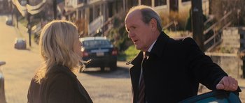 Movie still from “Jack Reacher” (2012), directed by Christopher McQuarrie – An older man and a young woman talking on the street; Close Up shot, Over the shoulder angle