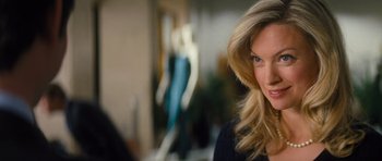 Movie still from “Jack Reacher” (2012), directed by Christopher McQuarrie – A woman with blonde hair and blue eyes; Close Up shot, Over the shoulder angle