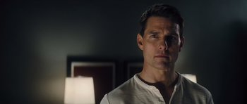 Movie still from “Jack Reacher” (2012), directed by Christopher McQuarrie – A person wearing a white shirt; Close Up shot, Over the shoulder angle