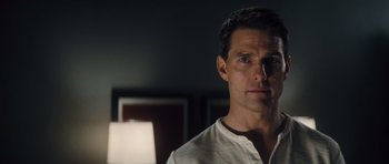 Movie still from “Jack Reacher” (2012), directed by Christopher McQuarrie – A person wearing a white shirt; Close Up shot, Over the shoulder angle