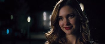 Movie still from “Jack Reacher” (2012), directed by Christopher McQuarrie – A person with long brown hair; Close Up shot, Over the shoulder angle