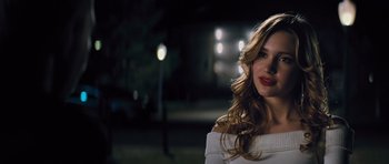 Movie still from “Jack Reacher” (2012), directed by Christopher McQuarrie – A beautiful young woman with long , blonde hair; Close Up shot, Low angle