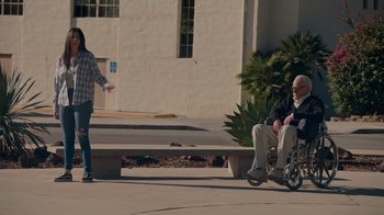 Movie still from “Jackass 4.5” (2022), directed by Jeff Tremaine – An older man in a wheelchair and an older woman in a wheelchair; Wide shot, Over the shoulder angle