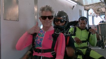 Movie still from “Jackass 4.5” (2022), directed by Jeff Tremaine – A man in a pink jacket and a black helmet; Medium shot, Overhead angle