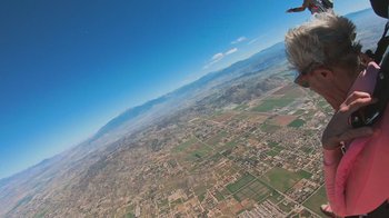 Movie still from “Jackass 4.5” (2022), directed by Jeff Tremaine – An aerial view of a large area of land; Extreme Wide shot, Low angle