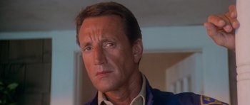 Movie still from “Jaws 2” (1978), directed by Jeannot Szwarc – A person wearing a jacket; Close Up shot, Low angle