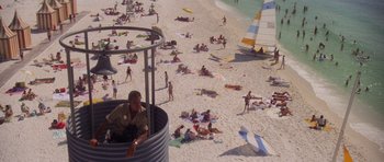 Movie still from “Jaws 2” (1978), directed by Jeannot Szwarc – A crowd of people laying on the beach; Extreme Wide shot, High angle