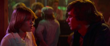 Movie still from “Jaws 2” (1978), directed by Jeannot Szwarc – A man and a woman talking to each other in a room; Close Up shot, Over the shoulder angle