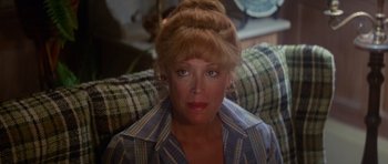 Movie still from “Jaws 2” (1978), directed by Jeannot Szwarc – A person wearing a plaid shirt; Close Up shot, Over the shoulder angle