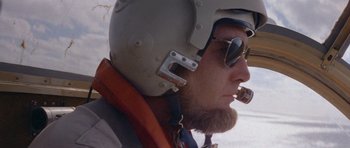 Movie still from “Jaws 2” (1978), directed by Jeannot Szwarc – A person wearing a helmet; Close Up shot, Low angle