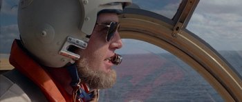 Movie still from “Jaws 2” (1978), directed by Jeannot Szwarc – A person wearing a helmet and sunglasses; Close Up shot, Low angle