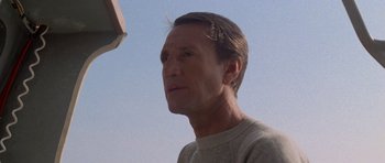 Movie still from “Jaws 2” (1978), directed by Jeannot Szwarc – A person looking at the sky; Close Up shot, Low angle