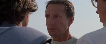 Movie still from “Jaws 2” (1978), directed by Jeannot Szwarc – A person looking at the camera; Close Up shot, Over the shoulder angle